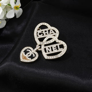 CHANEL Lucienne Heart Emblem Statement Brooch